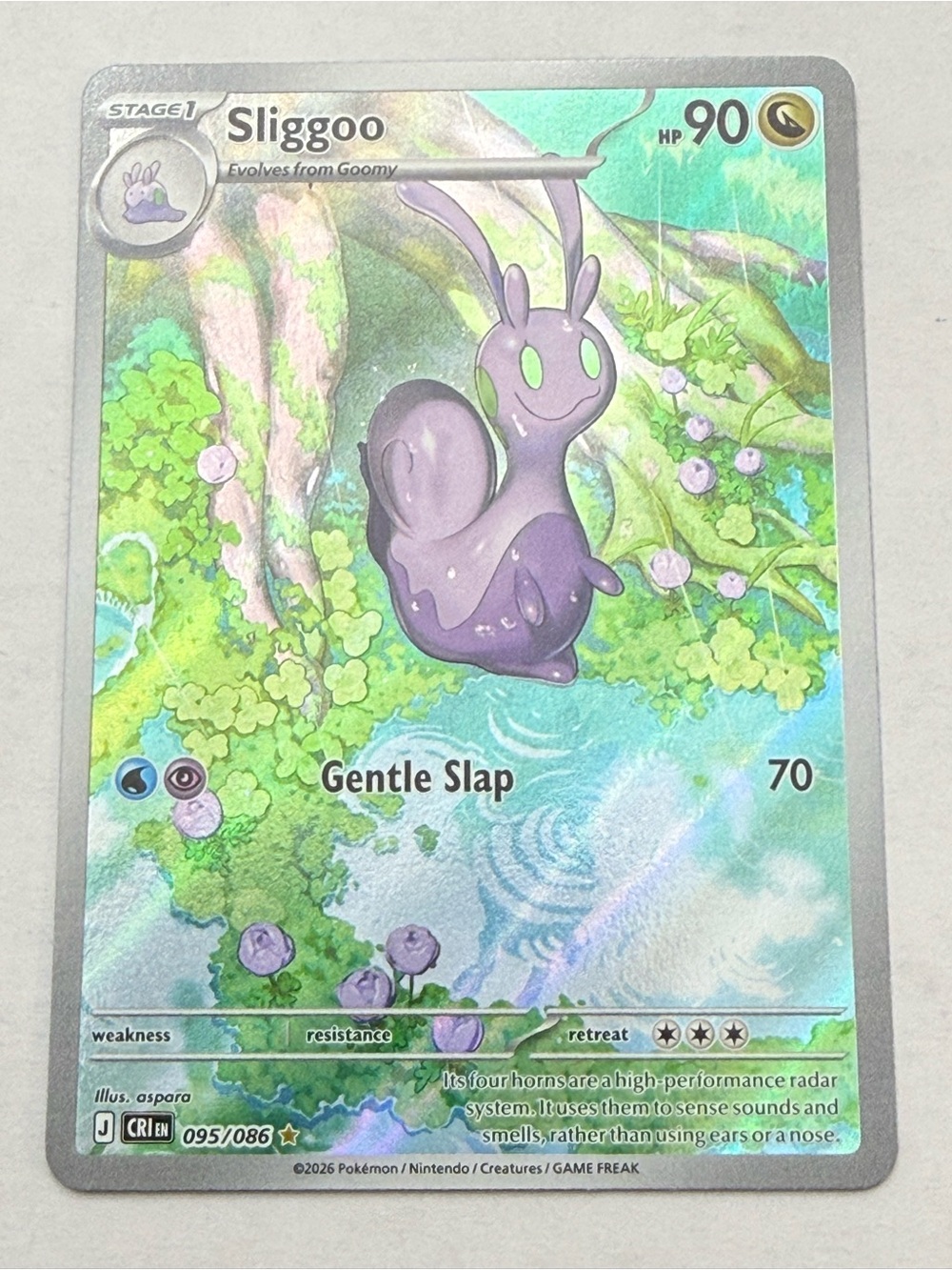Pokemon Sliggoo Holographic Card - Purple and Green